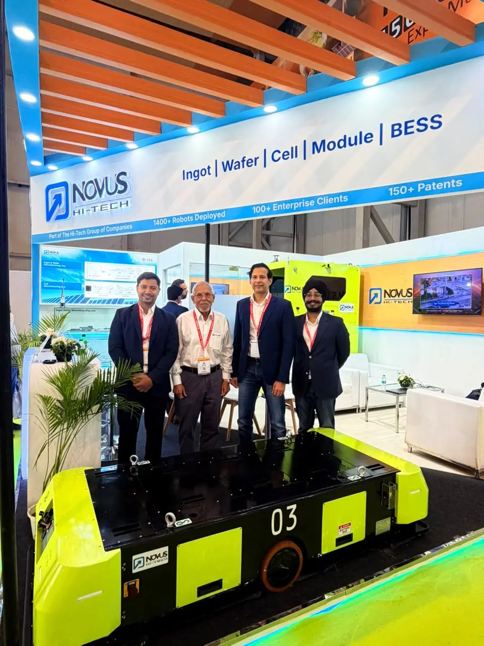 Novus Hi-Tech team with its AGV for solar cell and BESS manufacturing at REI Expo 2026